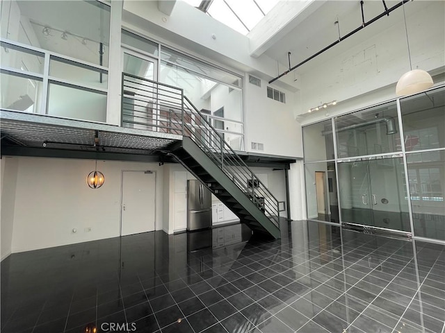 420 S San Pedro St Unit 102, Los Angeles, CA 90013 - common area with a high ceiling and stairs