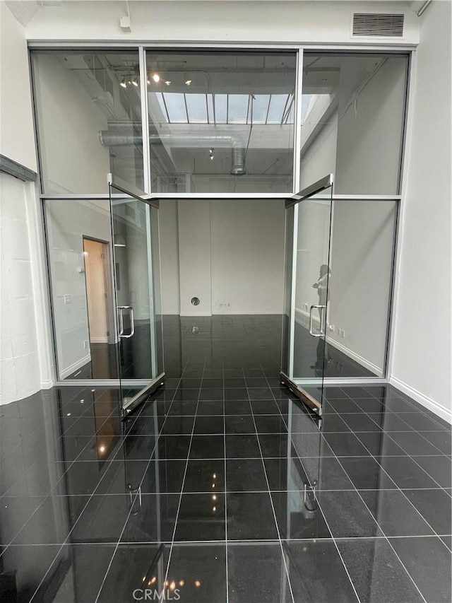 420 S San Pedro St Unit 102, Los Angeles, CA 90013 - bathroom featuring tile patterned floors and baseboards