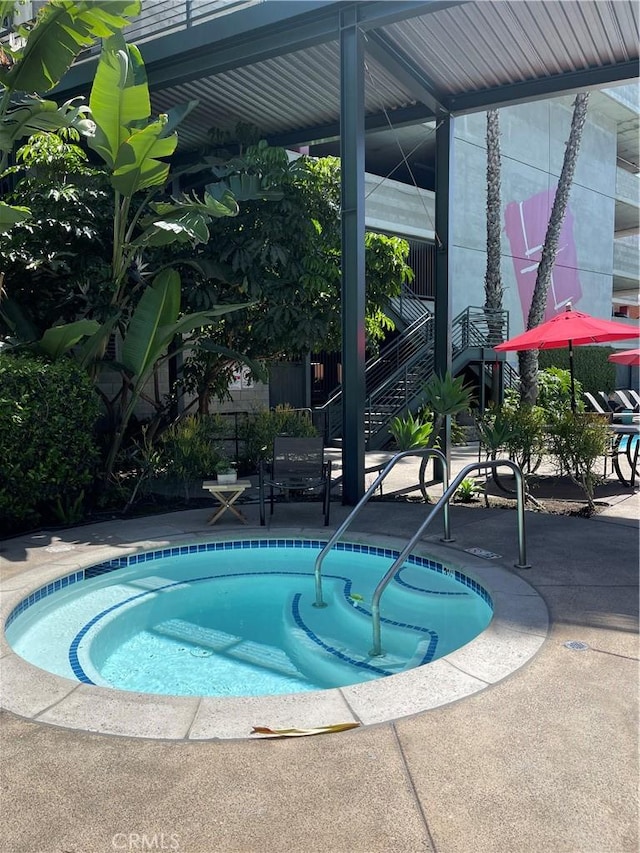 420 S San Pedro St Unit 102, Los Angeles, CA 90013 - view of swimming pool featuring a patio area and stairs