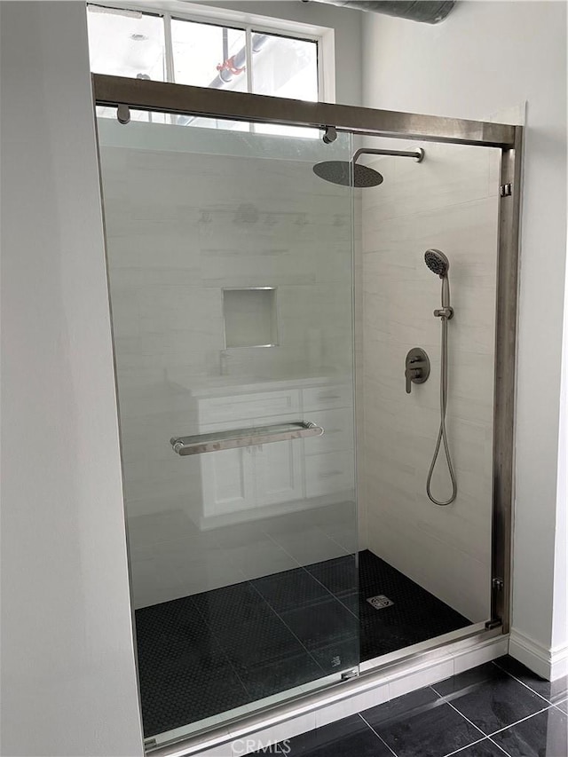 420 S San Pedro St Unit 102, Los Angeles, CA 90013 - bathroom with tile patterned floors and a stall shower