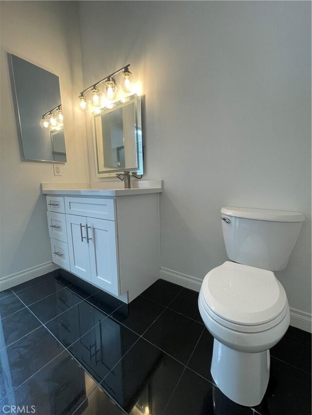 420 S San Pedro St Unit 102, Los Angeles, CA 90013 - bathroom featuring tile patterned floors, baseboards, and toilet