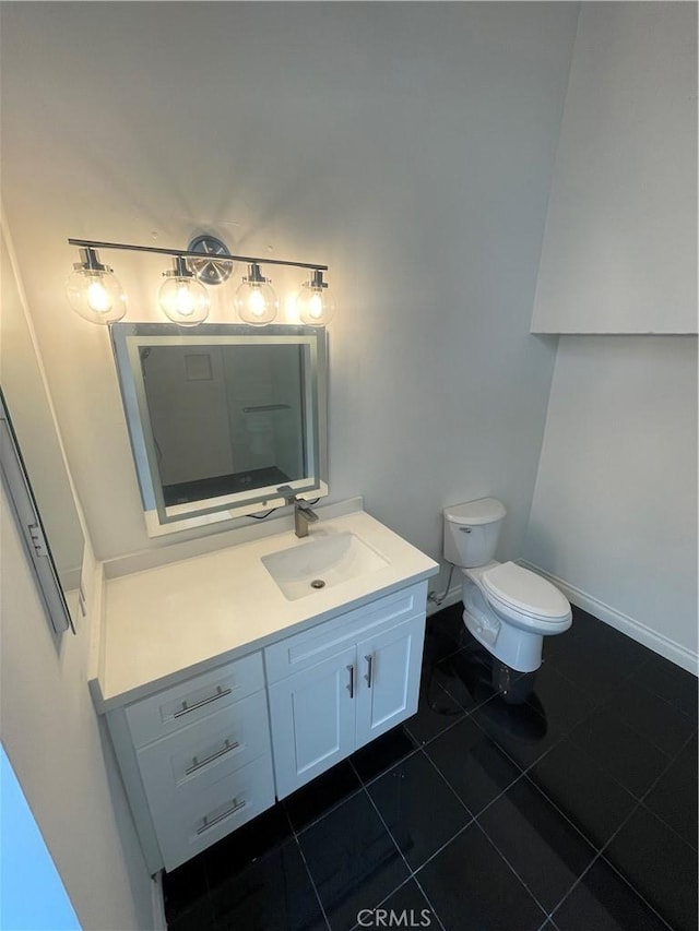 420 S San Pedro St Unit 102, Los Angeles, CA 90013 - half bathroom with vanity, tile patterned floors, and toilet