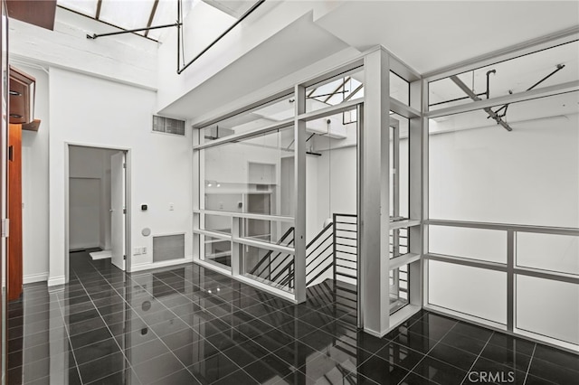 420 S San Pedro St Unit 102, Los Angeles, CA 90013 - spacious closet featuring a towering ceiling