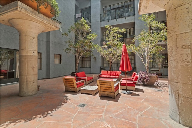 420 S San Pedro St Unit 102, Los Angeles, CA 90013 - view of patio featuring an outdoor living space