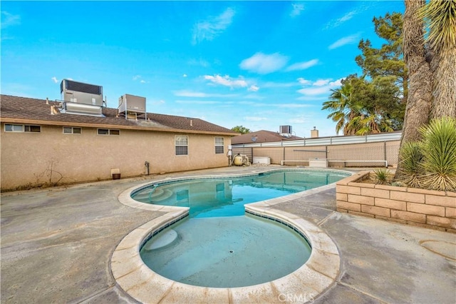 58957 Pueblo Trl, Yucca Valley, CA 92284 - view of pool featuring a patio, central AC unit, a fenced backyard, and a fenced in pool