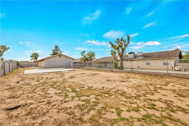 58957 Pueblo Trl, Yucca Valley, CA 92284 - view of yard with a patio and a fenced backyard
