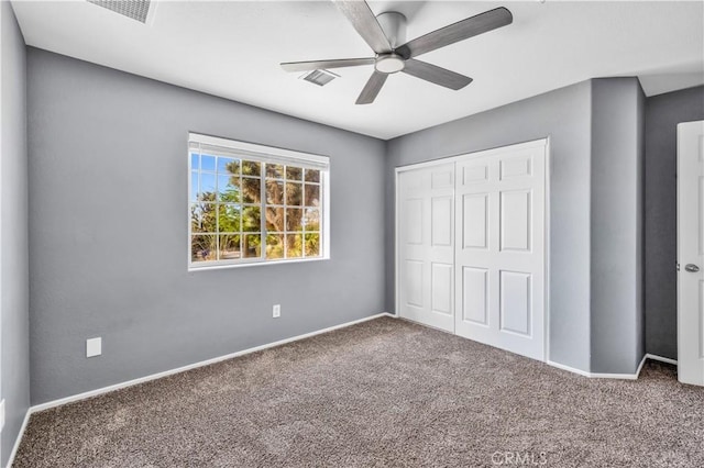 58957 Pueblo Trl, Yucca Valley, CA 92284 - unfurnished bedroom featuring visible vents, carpet, and a closet
