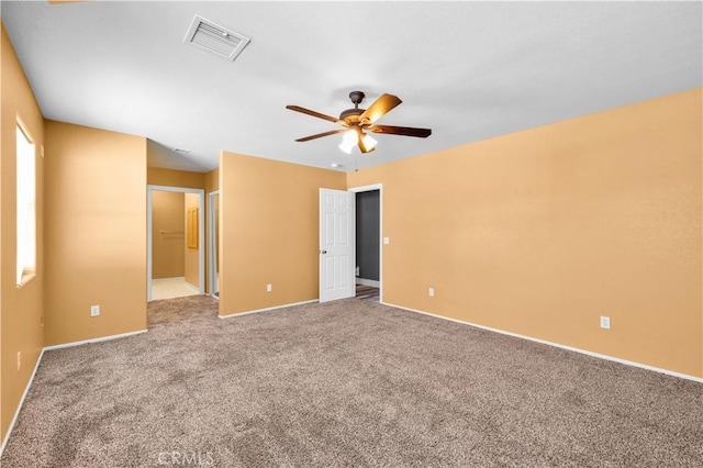 58957 Pueblo Trl, Yucca Valley, CA 92284 - carpeted empty room featuring ceiling fan, visible vents, and baseboards