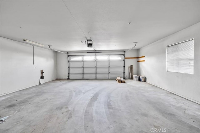 58957 Pueblo Trl, Yucca Valley, CA 92284 - garage featuring a garage door opener