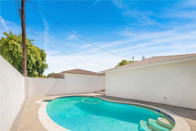 view of pool featuring a fenced in pool and fence