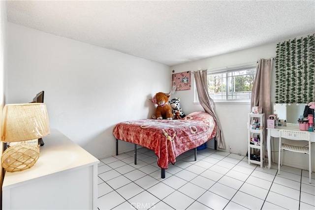 9684 Hemlock St, Rancho Cucamonga, CA 91730 - bedroom featuring a textured ceiling and light tile patterned floors