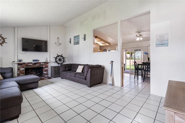 9684 Hemlock St, Rancho Cucamonga, CA 91730 - living room with vaulted ceiling, a textured ceiling, light tile patterned flooring, a ceiling fan, and a brick fireplace