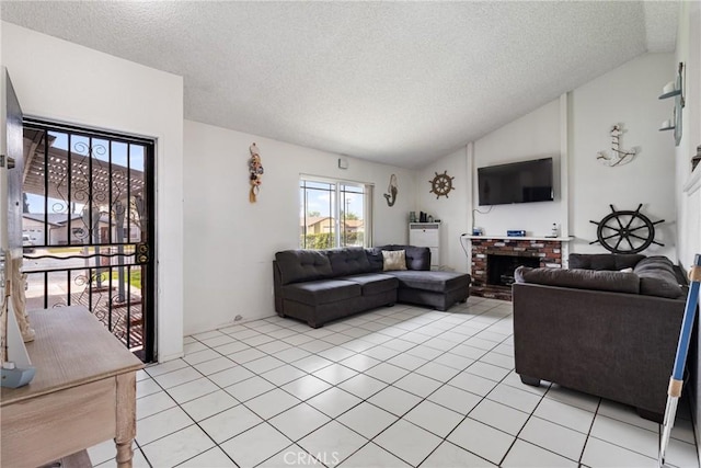 9684 Hemlock St, Rancho Cucamonga, CA 91730 - living area with a textured ceiling, vaulted ceiling, plenty of natural light, and light tile patterned flooring