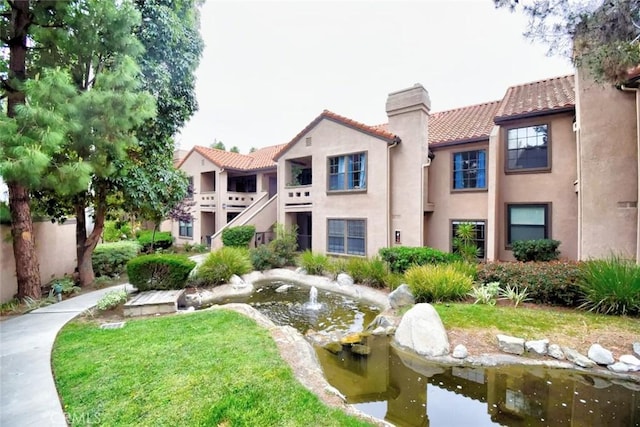 1052 Calle Del Cerro Unit 705, San Clemente, CA 92672 - surrounding community featuring a garden pond