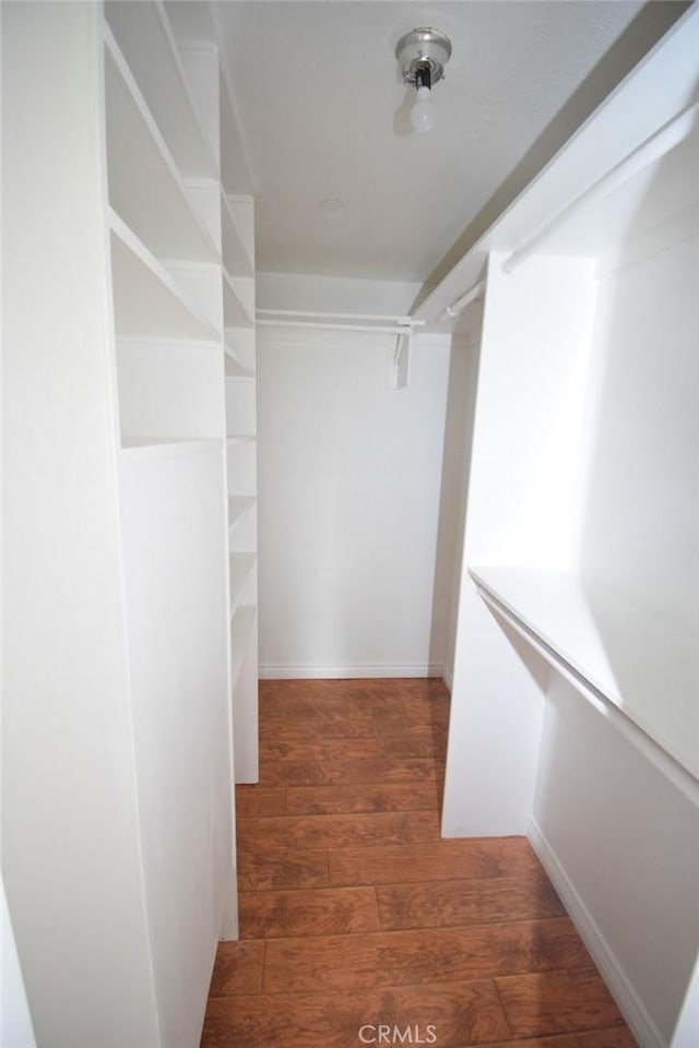 1052 Calle Del Cerro Unit 705, San Clemente, CA 92672 - spacious closet with wood finished floors