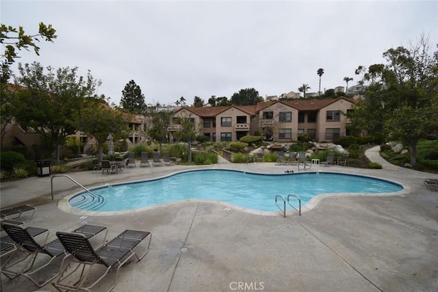 1052 Calle Del Cerro Unit 705, San Clemente, CA 92672 - community pool with a patio and a residential view
