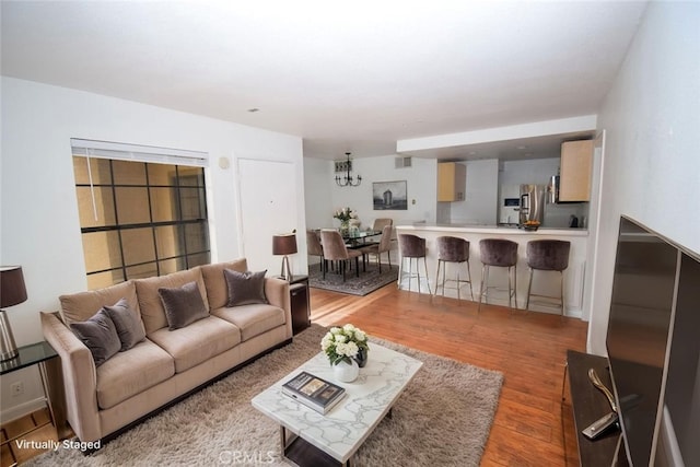 1052 Calle Del Cerro Unit 705, San Clemente, CA 92672 - living room with wood finished floors