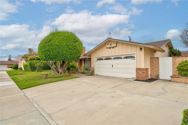 1528 E San Alto Ave, Orange, CA 92865 - single story home featuring an attached garage, fence, brick siding, and concrete driveway