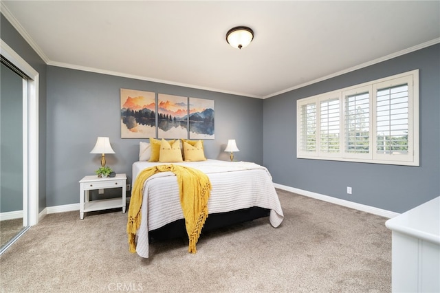 carpeted bedroom with baseboards and ornamental molding
