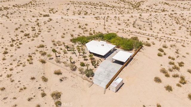 bird's eye view with a rural view and a desert view