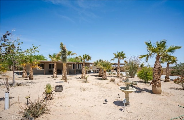 rear view of house featuring a patio area