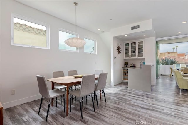 48 57th Pl, Long Beach, CA 90803 - dining space featuring baseboards, recessed lighting, wood finished floors, and visible vents