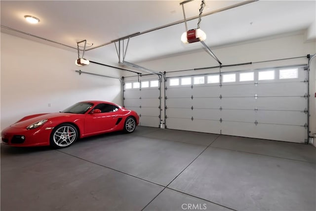 48 57th Pl, Long Beach, CA 90803 - garage featuring a garage door opener