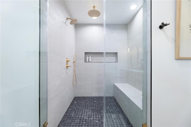 full bathroom with a shower stall
