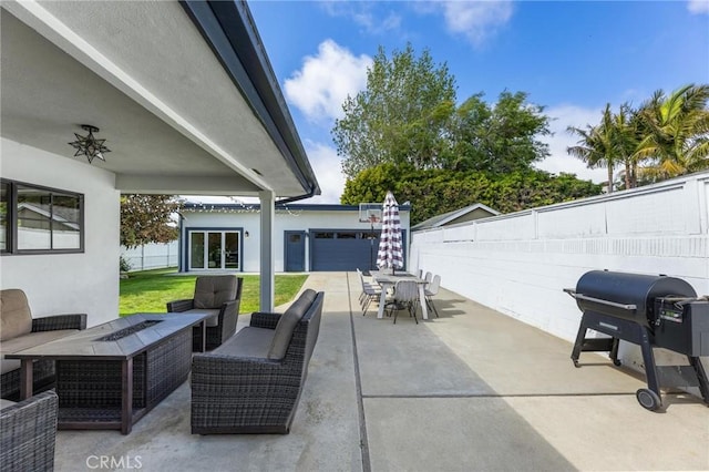 view of patio / terrace featuring outdoor dining space, fence, an outdoor living space, and grilling area
