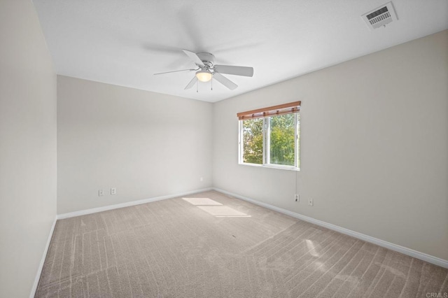 28829 Golden Dawn Dr, Menifee, CA 92584 - carpeted empty room featuring visible vents, a ceiling fan, and baseboards