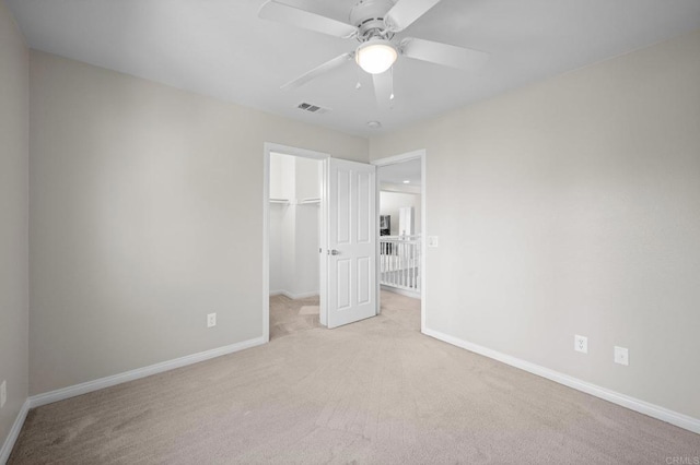 28829 Golden Dawn Dr, Menifee, CA 92584 - unfurnished bedroom featuring carpet floors, baseboards, a spacious closet, and a closet