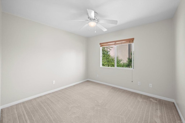 28829 Golden Dawn Dr, Menifee, CA 92584 - empty room with a ceiling fan, baseboards, and light colored carpet