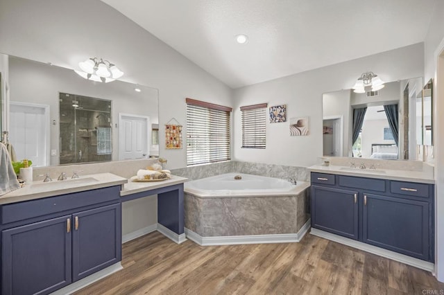 28829 Golden Dawn Dr, Menifee, CA 92584 - full bath featuring a sink, a stall shower, a bath, and lofted ceiling