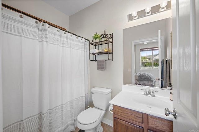 28829 Golden Dawn Dr, Menifee, CA 92584 - full bath with vanity, baseboards, and toilet