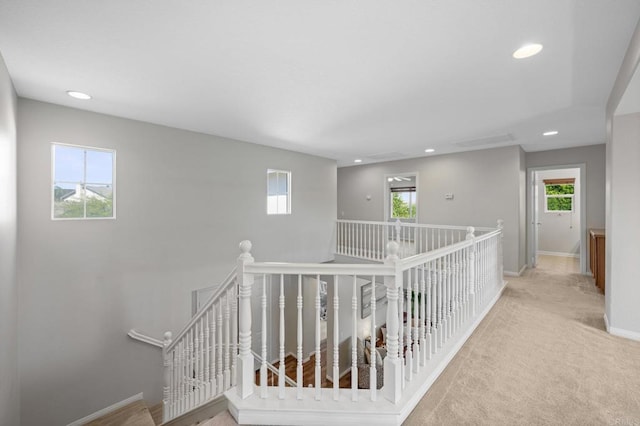 28829 Golden Dawn Dr, Menifee, CA 92584 - corridor with carpet flooring, recessed lighting, baseboards, and an upstairs landing