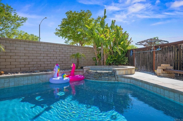 28829 Golden Dawn Dr, Menifee, CA 92584 - view of pool with a fenced backyard and a pool with connected hot tub