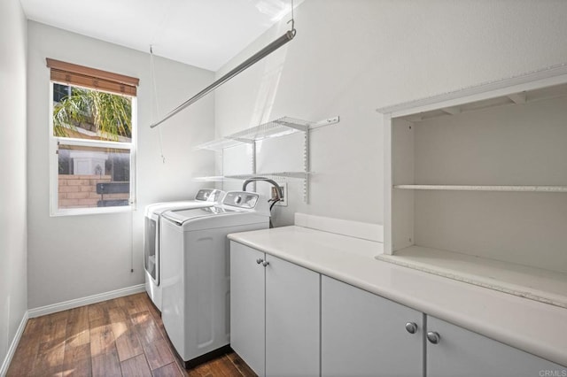 28829 Golden Dawn Dr, Menifee, CA 92584 - washroom with cabinet space, baseboards, dark wood-style floors, and washer and clothes dryer