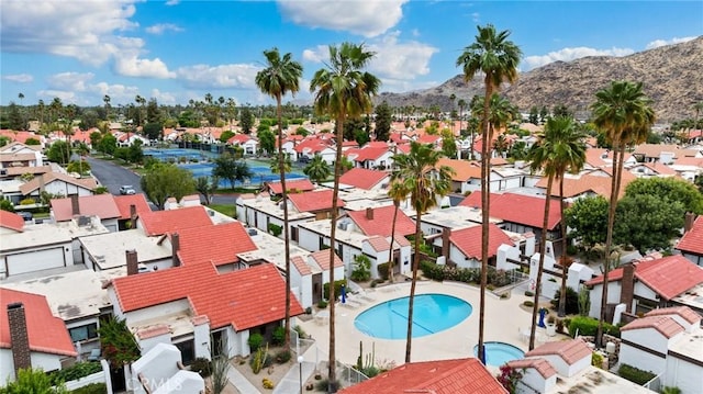 aerial view featuring a mountain view and a residential view