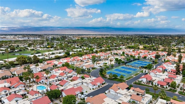 drone / aerial view featuring a mountain view and a residential view