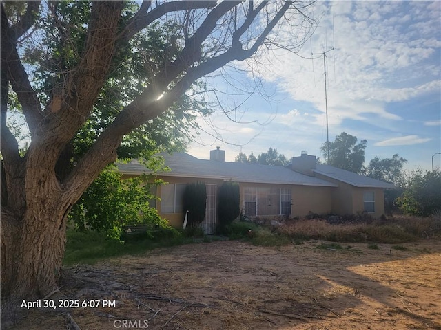 18340 Delicious St, Adelanto, CA 92301 - view of front facade with a chimney