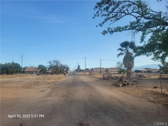 18340 Delicious St, Adelanto, CA 92301 - view of dirt / gravel road featuring a rural view