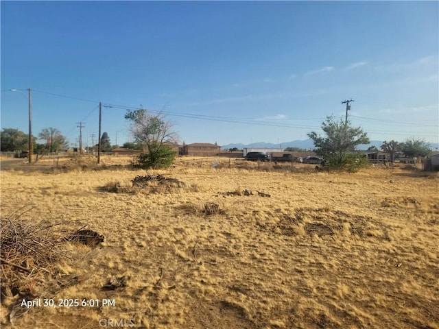 18340 Delicious St, Adelanto, CA 92301 - view of yard with a view of countryside and a mountain view