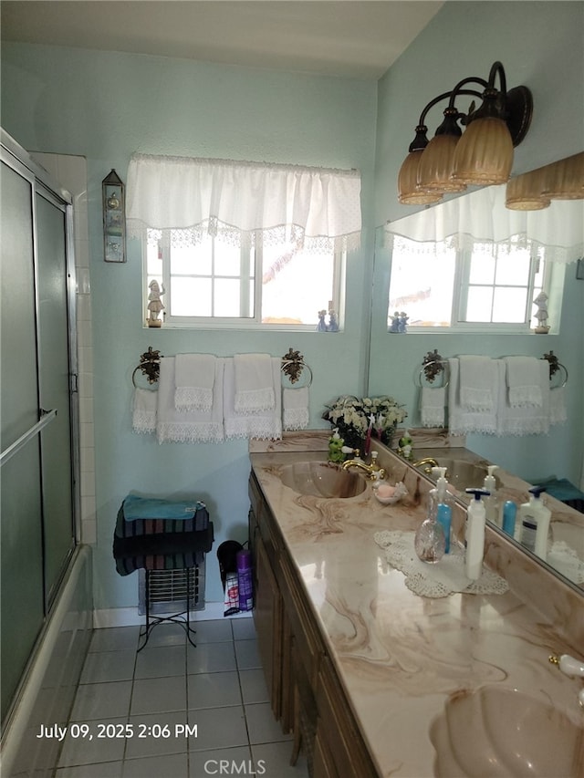 18340 Delicious St, Adelanto, CA 92301 - bathroom featuring tile patterned flooring, vanity, and bath / shower combo with glass door
