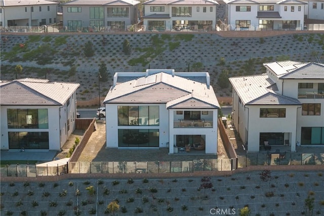 11818 N Hillsborough Ln, Porter Ranch, CA 91326 - back of house featuring a residential view, stucco siding, a patio area, and a tile roof