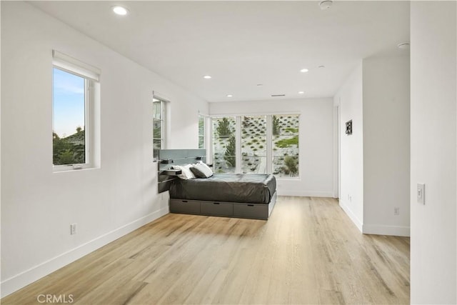 11818 N Hillsborough Ln, Porter Ranch, CA 91326 - living room with light wood finished floors, healthy amount of natural light, baseboards, and recessed lighting