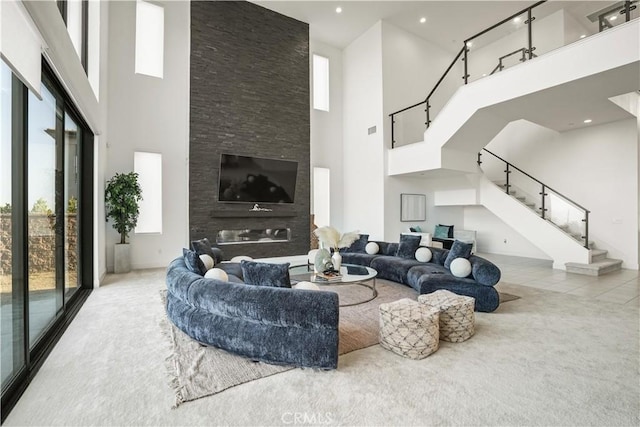 11818 N Hillsborough Ln, Porter Ranch, CA 91326 - living area featuring a towering ceiling, carpet, stairs, and recessed lighting