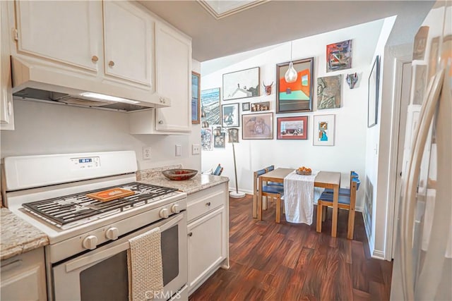 kitchen with white gas range, under cabinet range hood, dark wood-style flooring, and white cabinetry