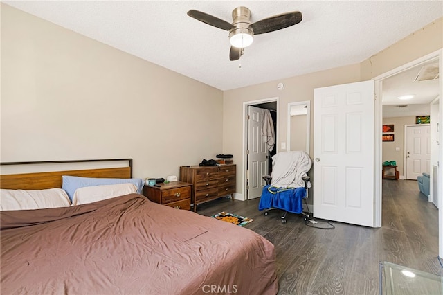 bedroom with a ceiling fan and wood finished floors