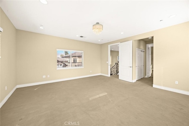 unfurnished bedroom featuring baseboards, carpet flooring, and recessed lighting