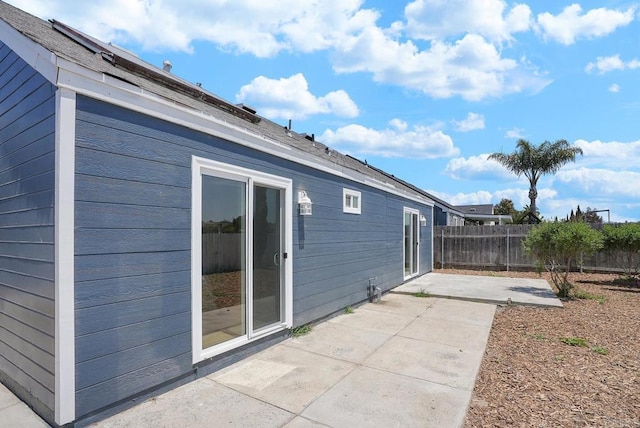 exterior space with a patio and fence private yard